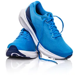 Pair of blue running shoes on a white background